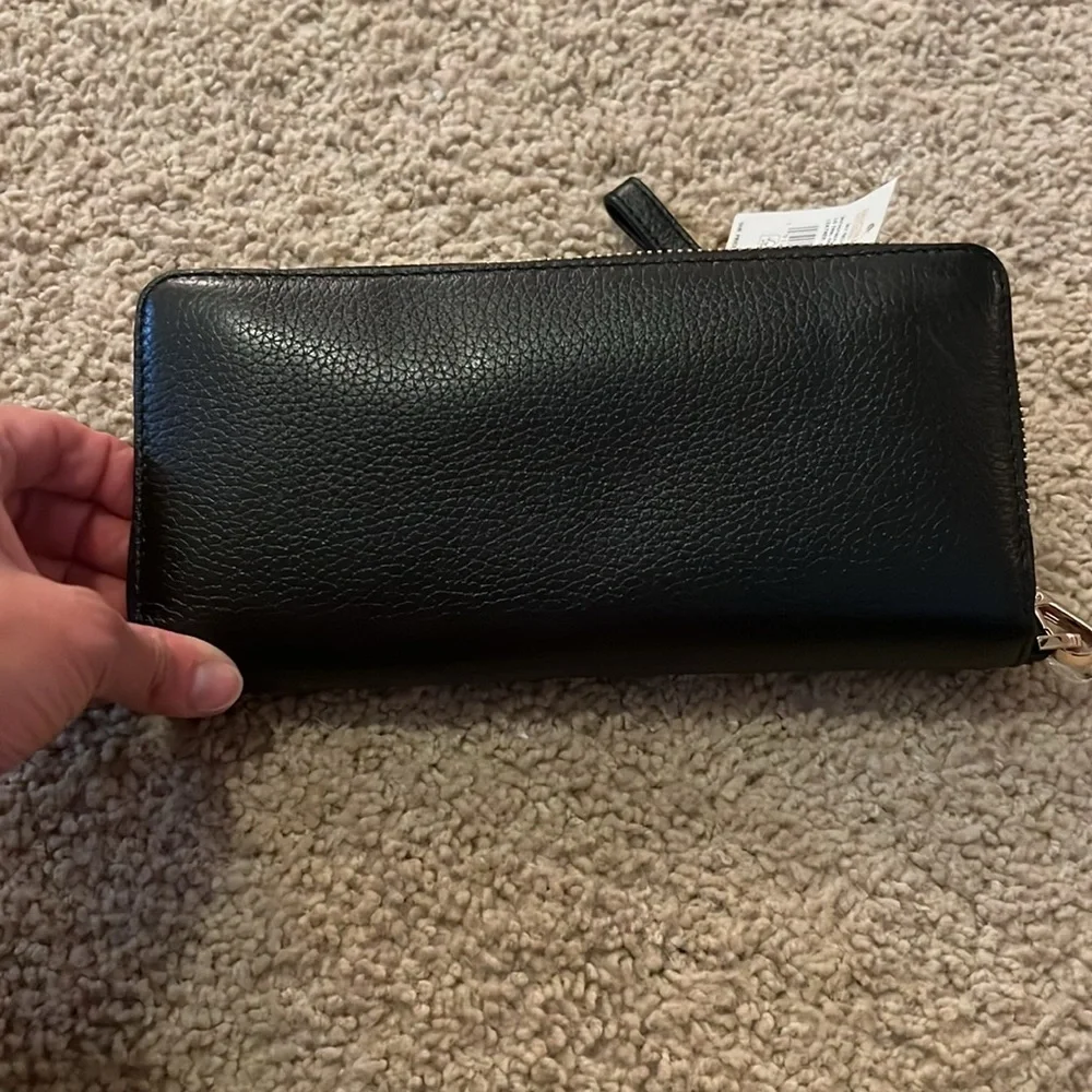 Michael Kors questions leave